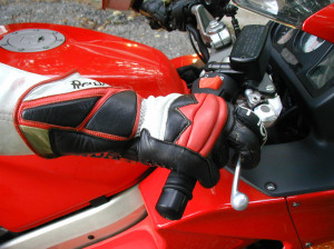 Two fingers or Four? I say two on most sportbikes.