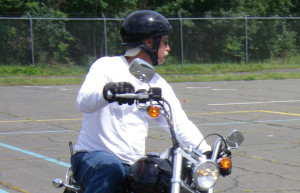 Turn your head, turn the handlebars, lean the bike, slip the clutch, drag the rear brake, and control the throttle. That's not too much to do, right?