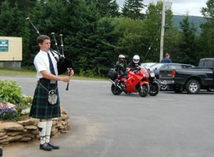 Here is a photo of a bagpiper. It has nothing to do with this article, but it does show the weird things you come across when on a motorcycle. Jeannine and Caroline look on.