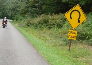 Downhill turns are challenging enough to put a sign up.