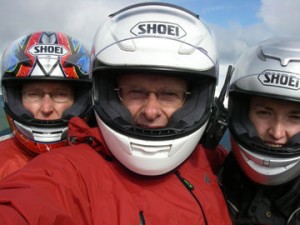 Three people, three motorcycles.