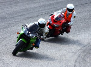 Ken follows Jeannine on the track early in her riding career.