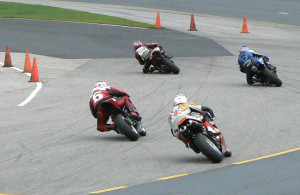 Trail braking is done all the time when racing to keep the competition at bay.