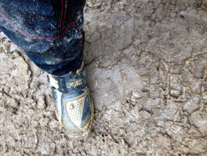 Slippery, Slimy Mud on hard packed rock.